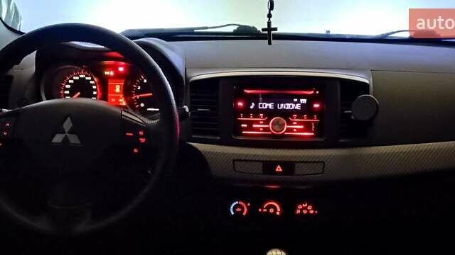 Серый Мицубиси Лансер, объемом двигателя 1.5 л и пробегом 230 тыс. км за 6300 $, фото 9 на Automoto.ua