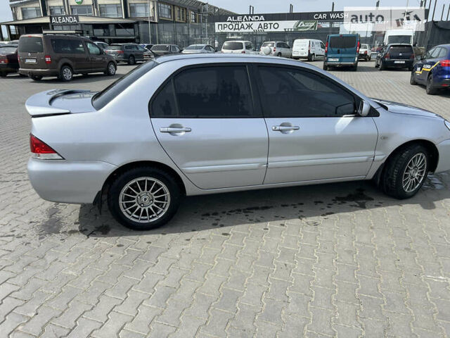 Сірий Міцубісі Lancer, об'ємом двигуна 1.6 л та пробігом 150 тис. км за 4999 $, фото 3 на Automoto.ua