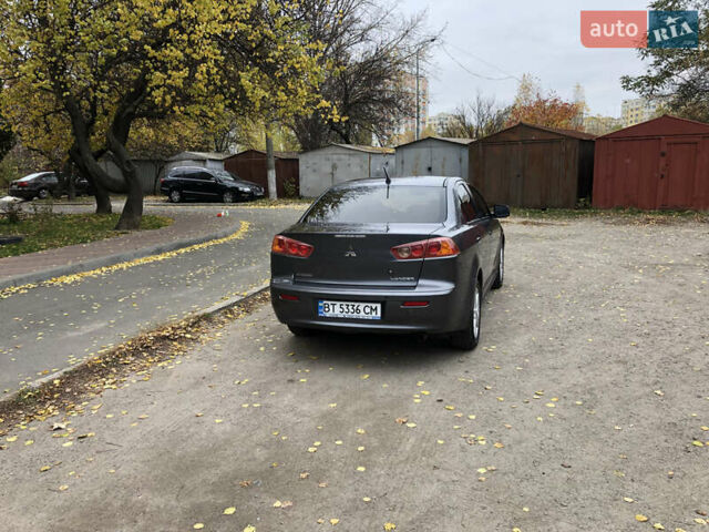 Сірий Міцубісі Lancer, об'ємом двигуна 2 л та пробігом 187 тис. км за 8000 $, фото 13 на Automoto.ua