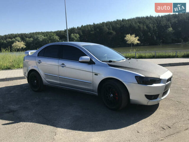 Серый Мицубиси Лансер, объемом двигателя 2 л и пробегом 256 тыс. км за 7000 $, фото 2 на Automoto.ua