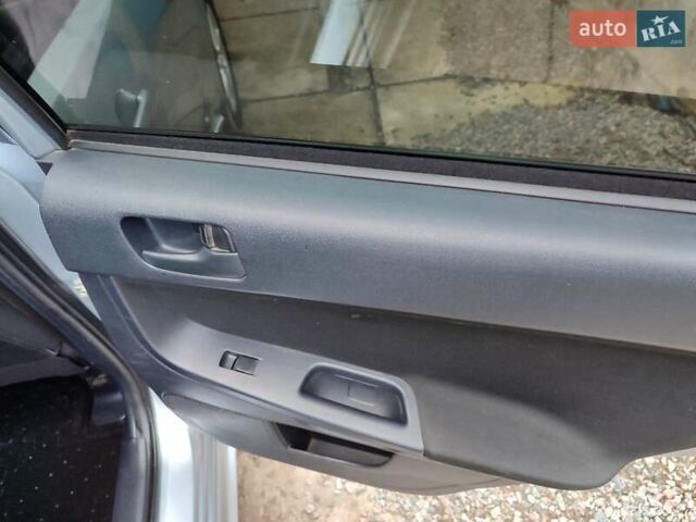 Серый Мицубиси Лансер, объемом двигателя 2 л и пробегом 234 тыс. км за 7200 $, фото 18 на Automoto.ua