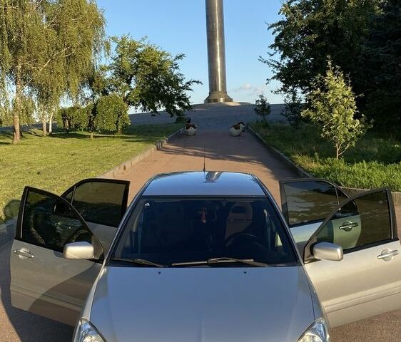 Сірий Міцубісі Lancer, об'ємом двигуна 1.6 л та пробігом 211 тис. км за 3899 $, фото 4 на Automoto.ua