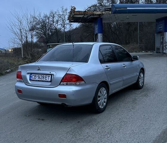 Сірий Міцубісі Lancer, об'ємом двигуна 1.6 л та пробігом 180 тис. км за 3900 $, фото 2 на Automoto.ua