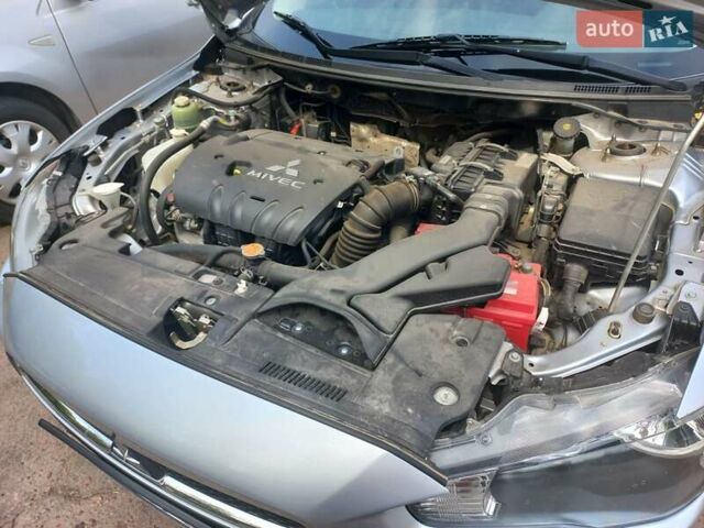 Серый Мицубиси Лансер, объемом двигателя 2 л и пробегом 103 тыс. км за 7700 $, фото 10 на Automoto.ua