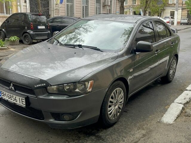Серый Мицубиси Лансер, объемом двигателя 1.5 л и пробегом 195 тыс. км за 6100 $, фото 2 на Automoto.ua