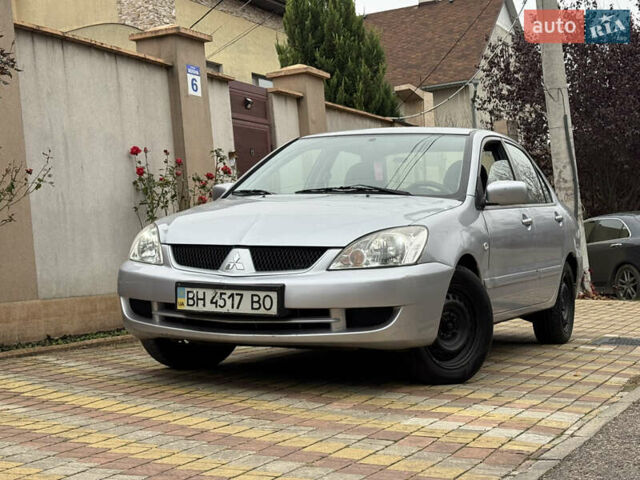 Сірий Міцубісі Lancer, об'ємом двигуна 1.6 л та пробігом 221 тис. км за 3650 $, фото 1 на Automoto.ua