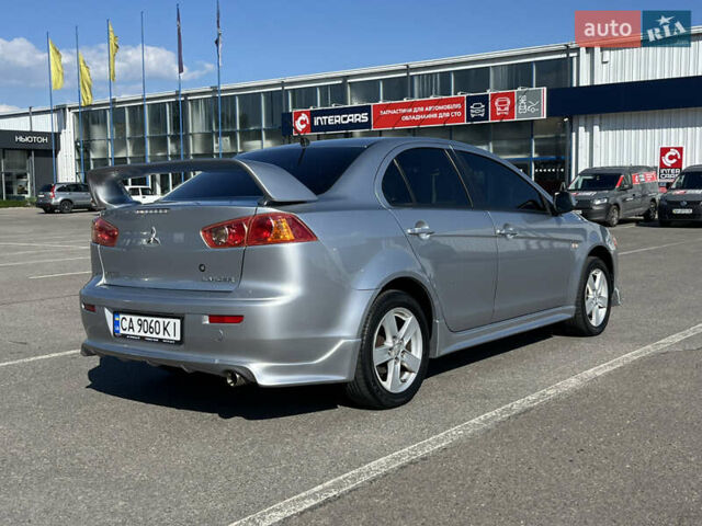 Сірий Міцубісі Lancer, об'ємом двигуна 2 л та пробігом 237 тис. км за 7200 $, фото 4 на Automoto.ua