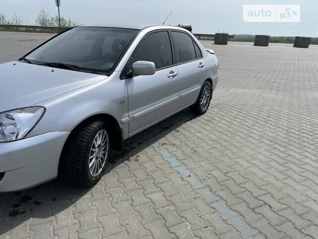 Сірий Міцубісі Lancer, об'ємом двигуна 1.6 л та пробігом 150 тис. км за 4999 $, фото 2 на Automoto.ua