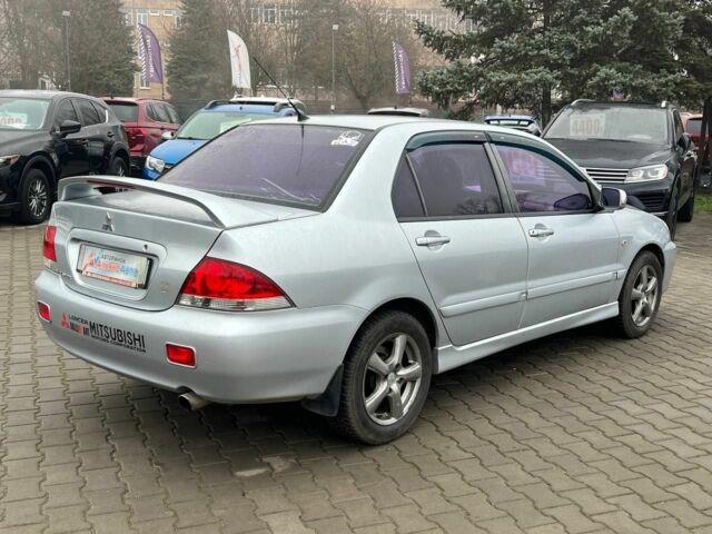Серый Мицубиси Лансер, объемом двигателя 1.6 л и пробегом 205 тыс. км за 5400 $, фото 6 на Automoto.ua
