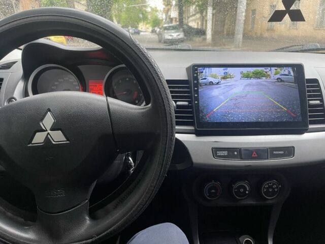 Серый Мицубиси Лансер, объемом двигателя 1.5 л и пробегом 195 тыс. км за 6100 $, фото 4 на Automoto.ua