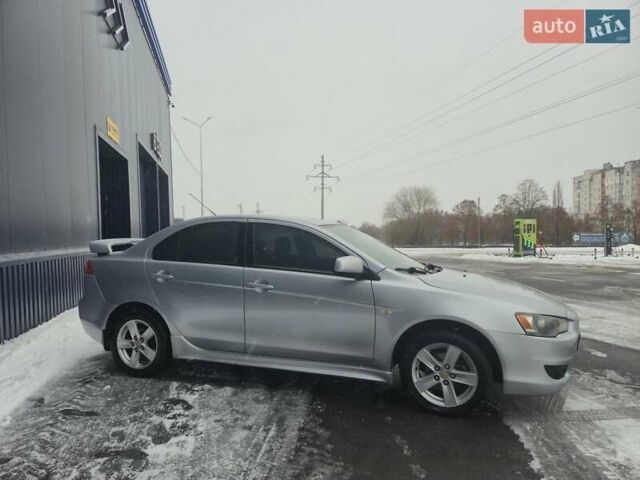 Серый Мицубиси Лансер, объемом двигателя 2 л и пробегом 240 тыс. км за 5900 $, фото 2 на Automoto.ua