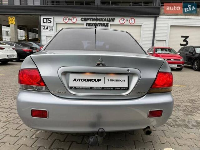 Сірий Міцубісі Lancer, об'ємом двигуна 1.6 л та пробігом 206 тис. км за 4799 $, фото 5 на Automoto.ua
