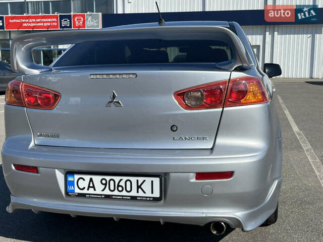 Сірий Міцубісі Lancer, об'ємом двигуна 2 л та пробігом 237 тис. км за 7200 $, фото 20 на Automoto.ua
