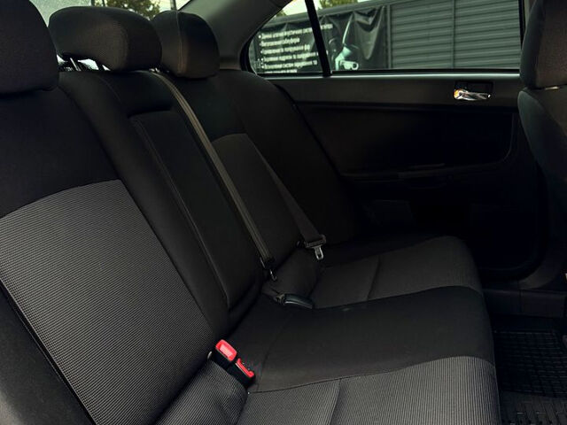 Сірий Міцубісі Lancer, об'ємом двигуна 2 л та пробігом 180 тис. км за 7600 $, фото 13 на Automoto.ua