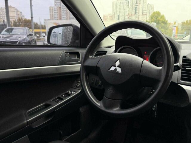 Сірий Міцубісі Lancer, об'ємом двигуна 1.5 л та пробігом 233 тис. км за 5890 $, фото 14 на Automoto.ua