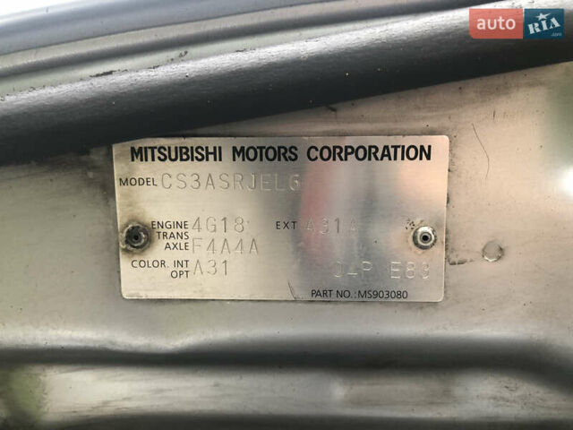 Сірий Міцубісі Lancer, об'ємом двигуна 1.58 л та пробігом 240 тис. км за 4299 $, фото 30 на Automoto.ua