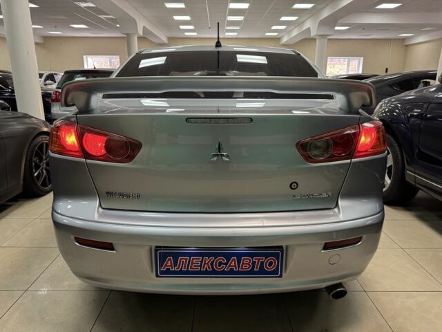 Серый Мицубиси Лансер, объемом двигателя 1.5 л и пробегом 241 тыс. км за 6400 $, фото 2 на Automoto.ua