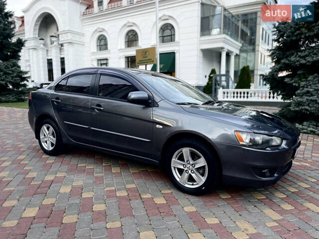 Серый Мицубиси Лансер, объемом двигателя 2 л и пробегом 212 тыс. км за 6000 $, фото 14 на Automoto.ua