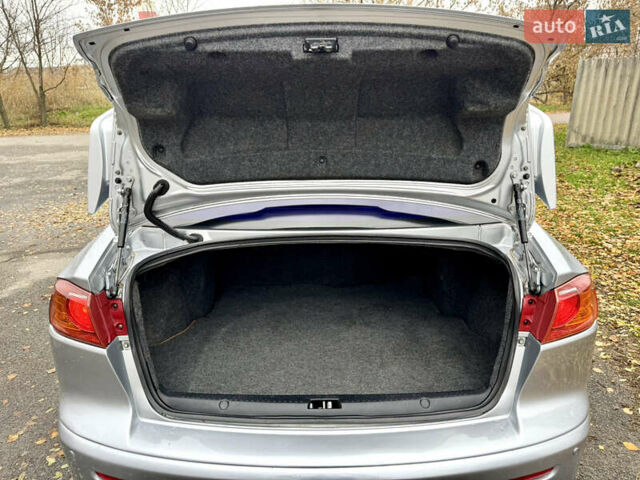 Сірий Міцубісі Lancer, об'ємом двигуна 2 л та пробігом 225 тис. км за 6890 $, фото 18 на Automoto.ua