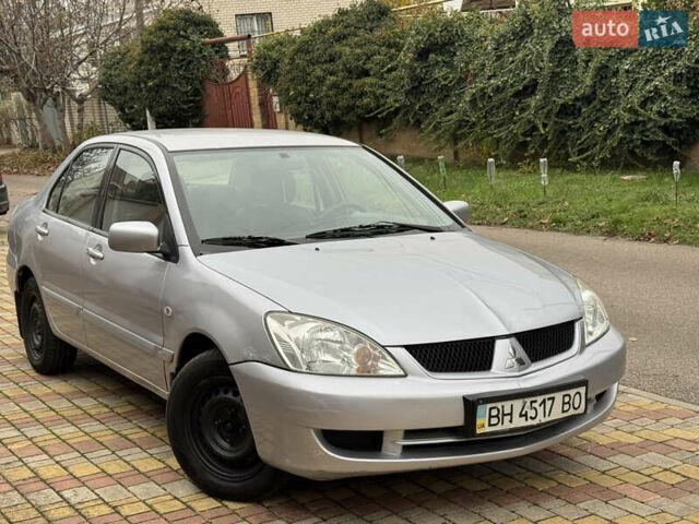 Сірий Міцубісі Lancer, об'ємом двигуна 1.6 л та пробігом 221 тис. км за 3650 $, фото 8 на Automoto.ua