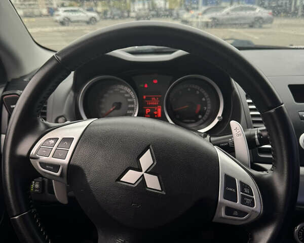Сірий Міцубісі Lancer, об'ємом двигуна 2 л та пробігом 185 тис. км за 7000 $, фото 14 на Automoto.ua