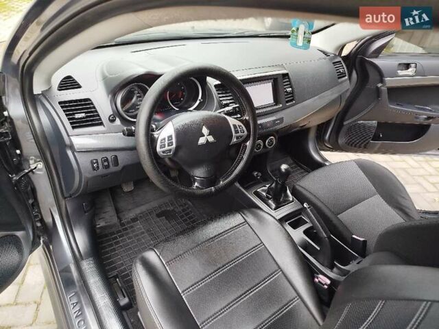 Міцубісі Lancer 2008 у Хмельницькому на Automoto.ua Сірий Міцубісі Lancer, об'ємом двигуна 2 л та пробігом 157 тис. км за 6300 $, фото 23 на Automoto.ua