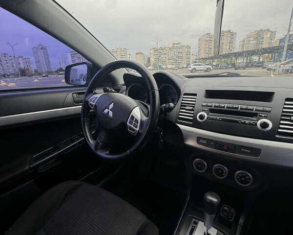 Сірий Міцубісі Lancer, об'ємом двигуна 2 л та пробігом 185 тис. км за 7000 $, фото 13 на Automoto.ua