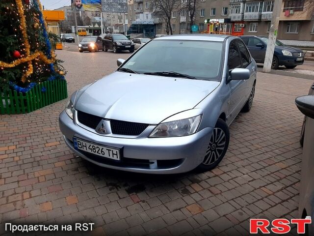 Сірий Міцубісі Lancer, об'ємом двигуна 1.6 л та пробігом 171 тис. км за 4550 $, фото 7 на Automoto.ua