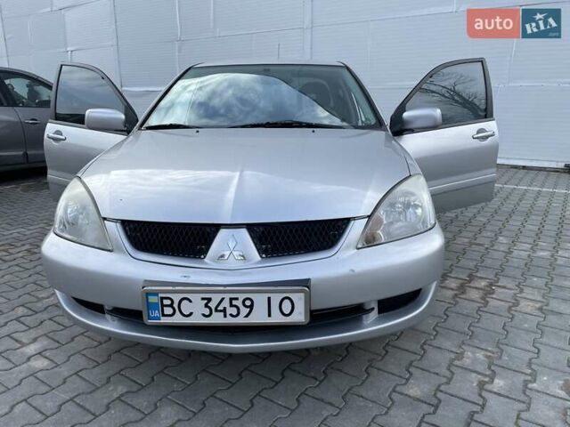 Сірий Міцубісі Lancer, об'ємом двигуна 1.6 л та пробігом 260 тис. км за 4200 $, фото 5 на Automoto.ua