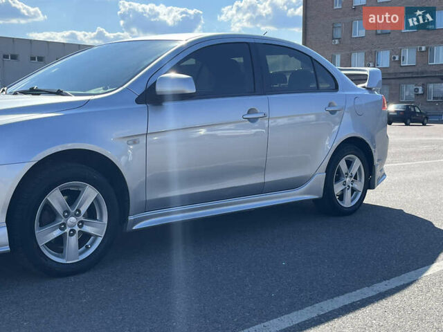 Сірий Міцубісі Lancer, об'ємом двигуна 2 л та пробігом 237 тис. км за 7200 $, фото 9 на Automoto.ua
