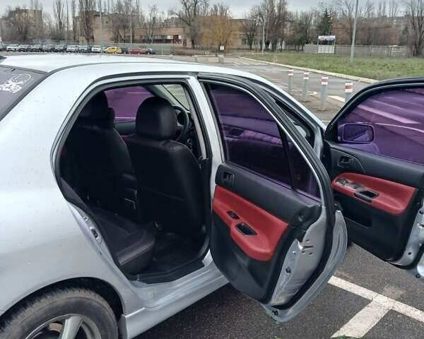 Сірий Міцубісі Lancer, об'ємом двигуна 1.6 л та пробігом 225 тис. км за 5200 $, фото 8 на Automoto.ua