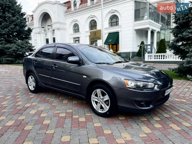 Серый Мицубиси Лансер, объемом двигателя 2 л и пробегом 212 тыс. км за 6000 $, фото 15 на Automoto.ua