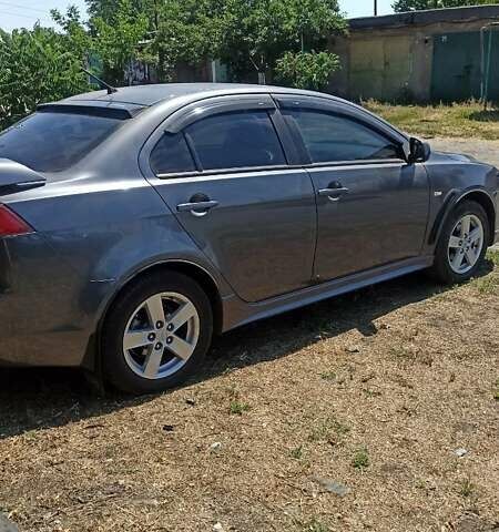 Сірий Міцубісі Lancer, об'ємом двигуна 2 л та пробігом 77 тис. км за 9800 $, фото 2 на Automoto.ua