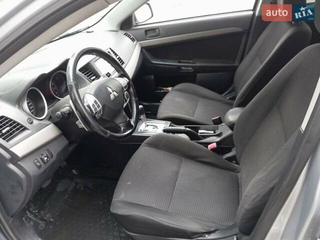Сірий Міцубісі Lancer, об'ємом двигуна 2 л та пробігом 275 тис. км за 6000 $, фото 5 на Automoto.ua