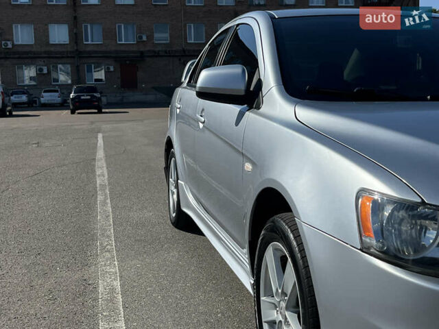Сірий Міцубісі Lancer, об'ємом двигуна 2 л та пробігом 237 тис. км за 7200 $, фото 13 на Automoto.ua