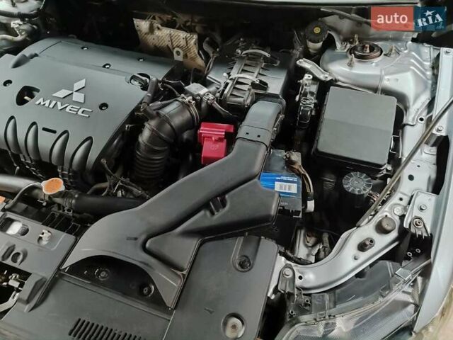 Серый Мицубиси Лансер, объемом двигателя 2 л и пробегом 234 тыс. км за 7200 $, фото 10 на Automoto.ua