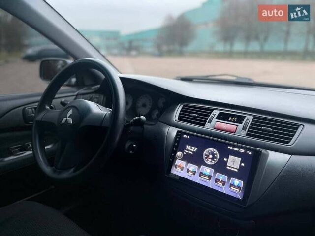 Сірий Міцубісі Lancer, об'ємом двигуна 1.6 л та пробігом 254 тис. км за 3800 $, фото 16 на Automoto.ua