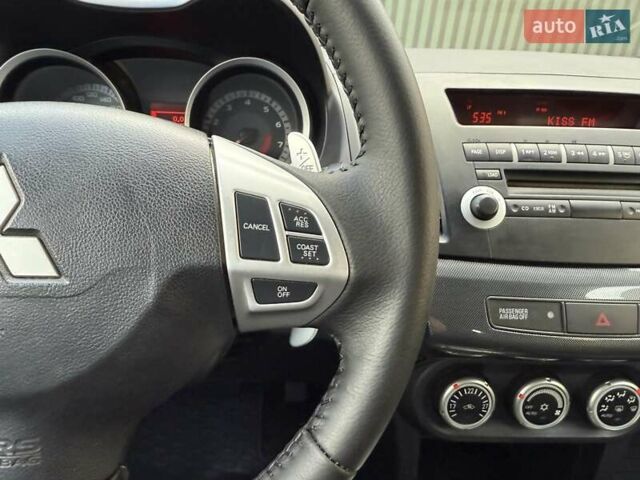 Серый Мицубиси Лансер, объемом двигателя 2 л и пробегом 230 тыс. км за 6900 $, фото 40 на Automoto.ua