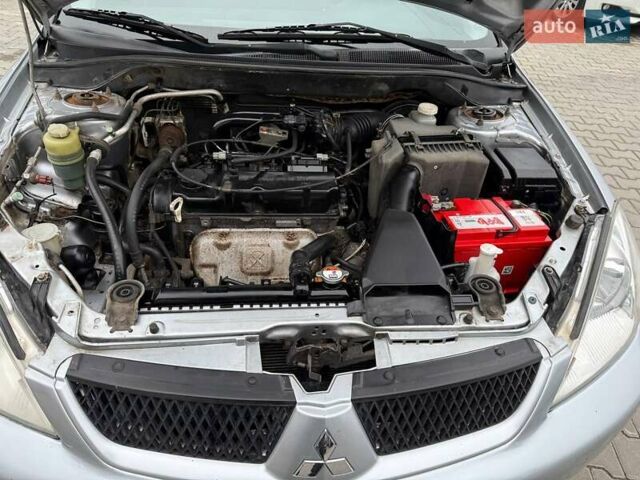 Сірий Міцубісі Lancer, об'ємом двигуна 1.6 л та пробігом 206 тис. км за 4799 $, фото 27 на Automoto.ua