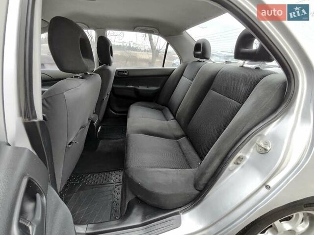 Серый Мицубиси Лансер, объемом двигателя 1.58 л и пробегом 185 тыс. км за 4700 $, фото 12 на Automoto.ua