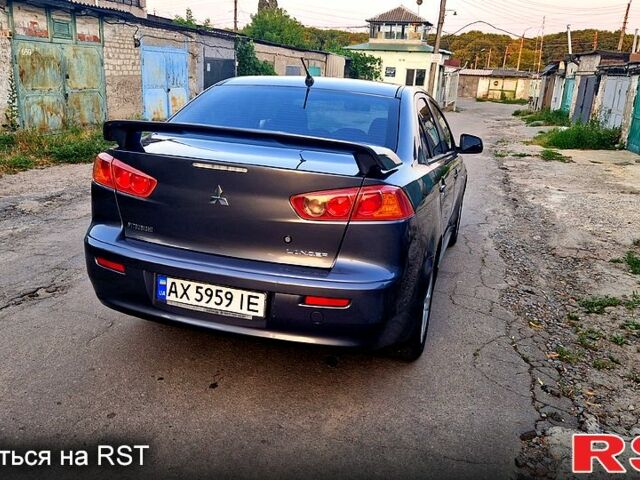 Серый Мицубиси Лансер, объемом двигателя 2 л и пробегом 246 тыс. км за 6500 $, фото 5 на Automoto.ua