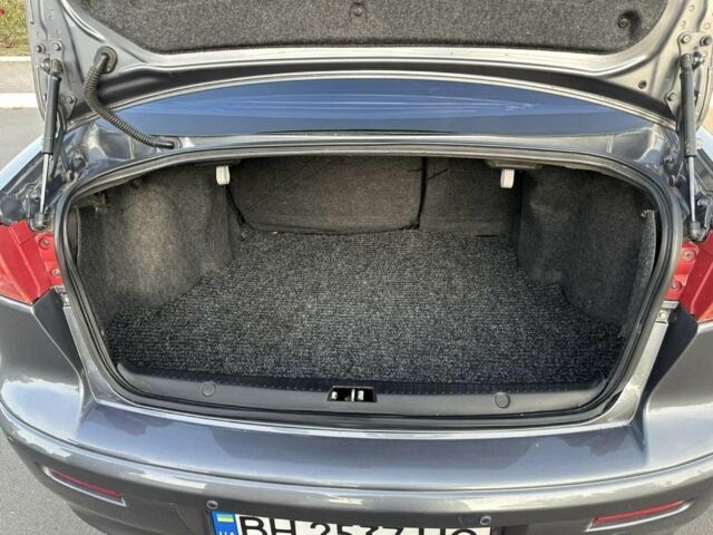 Сірий Міцубісі Lancer, об'ємом двигуна 2 л та пробігом 219 тис. км за 6700 $, фото 4 на Automoto.ua