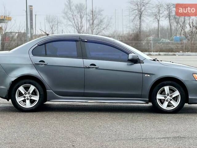 Серый Мицубиси Лансер, объемом двигателя 2 л и пробегом 203 тыс. км за 4999 $, фото 3 на Automoto.ua