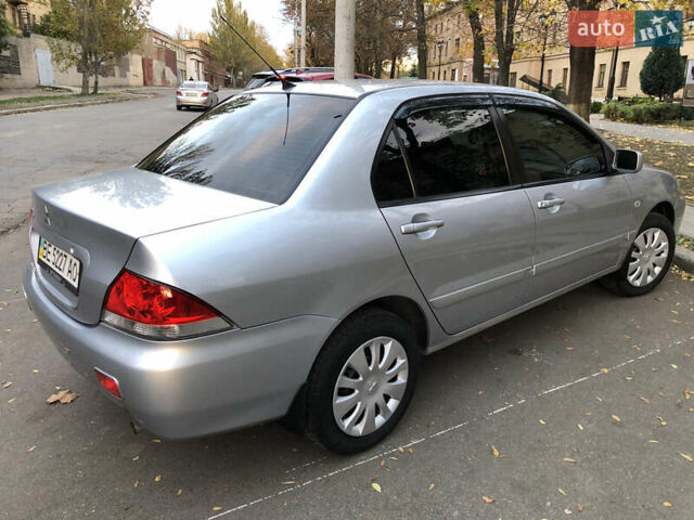 Мицубиси Лансер 2008 в Николаеве на Automoto.ua Серый Мицубиси Лансер, объемом двигателя 1.58 л и пробегом 132 тыс. км за 5900 $, фото 3 на Automoto.ua