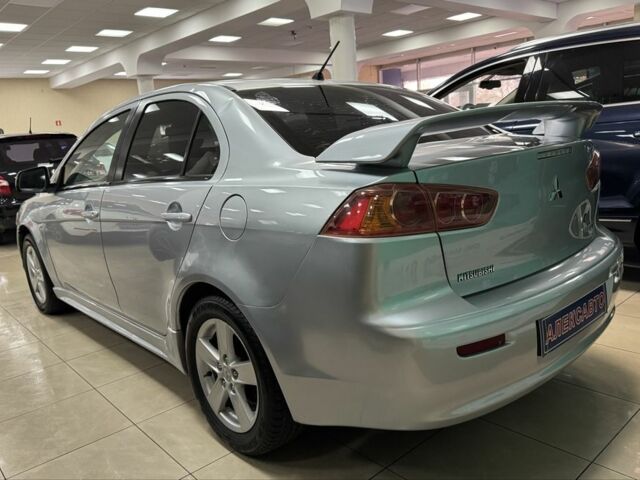 Серый Мицубиси Лансер, объемом двигателя 2 л и пробегом 172 тыс. км за 6300 $, фото 4 на Automoto.ua