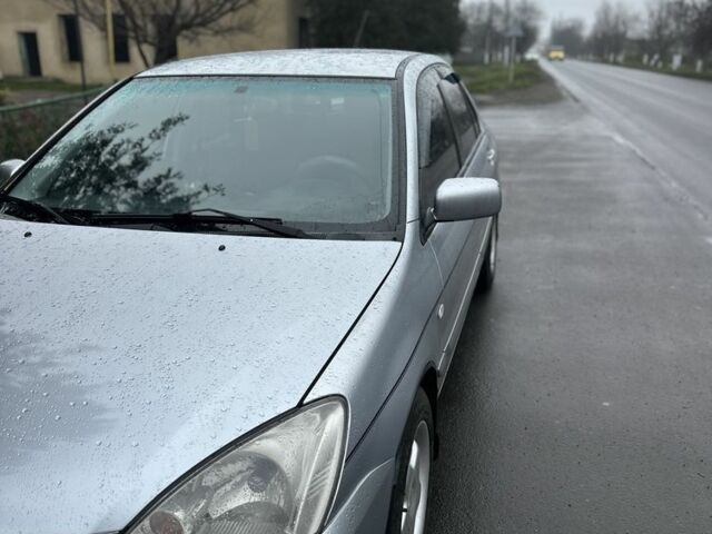 Сірий Міцубісі Lancer, об'ємом двигуна 1.6 л та пробігом 222 тис. км за 4300 $, фото 2 на Automoto.ua