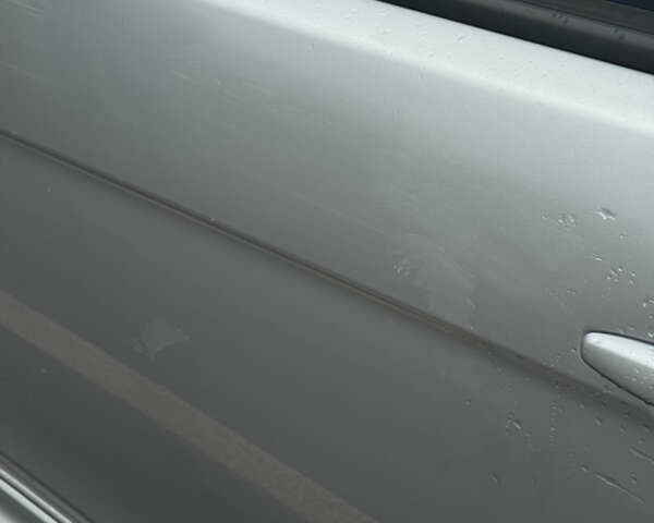 Сірий Міцубісі Lancer, об'ємом двигуна 2 л та пробігом 185 тис. км за 7000 $, фото 9 на Automoto.ua