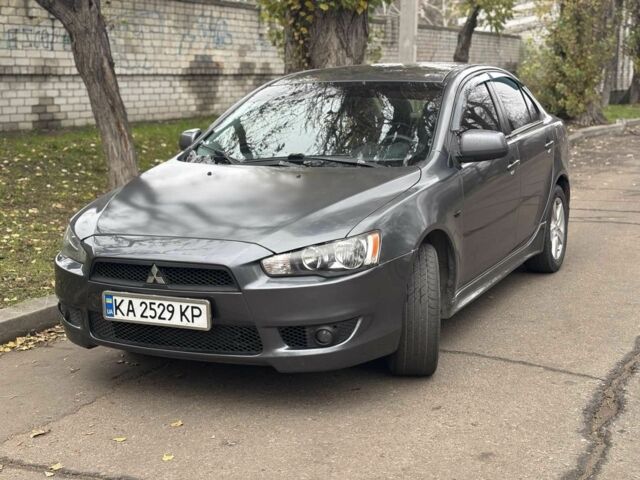 Серый Мицубиси Лансер, объемом двигателя 2 л и пробегом 240 тыс. км за 5450 $, фото 3 на Automoto.ua