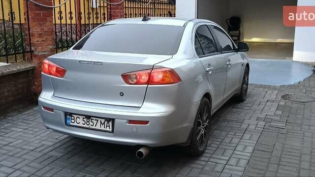 Серый Мицубиси Лансер, объемом двигателя 1.5 л и пробегом 230 тыс. км за 6300 $, фото 3 на Automoto.ua