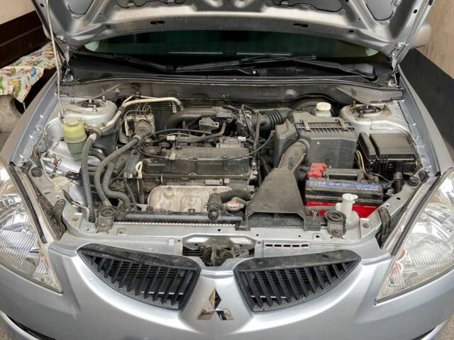 Сірий Міцубісі Lancer, об'ємом двигуна 1.6 л та пробігом 196 тис. км за 4700 $, фото 5 на Automoto.ua
